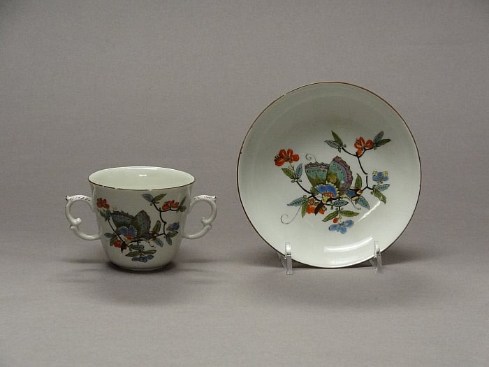 Two-Handled Cup and Saucer Slider Image 1