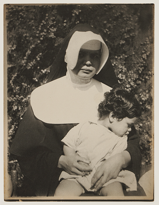 Nun with Orphan