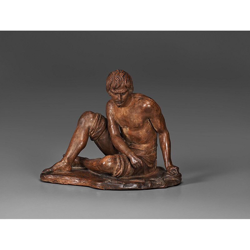 Young Man Seated Slider Image 1