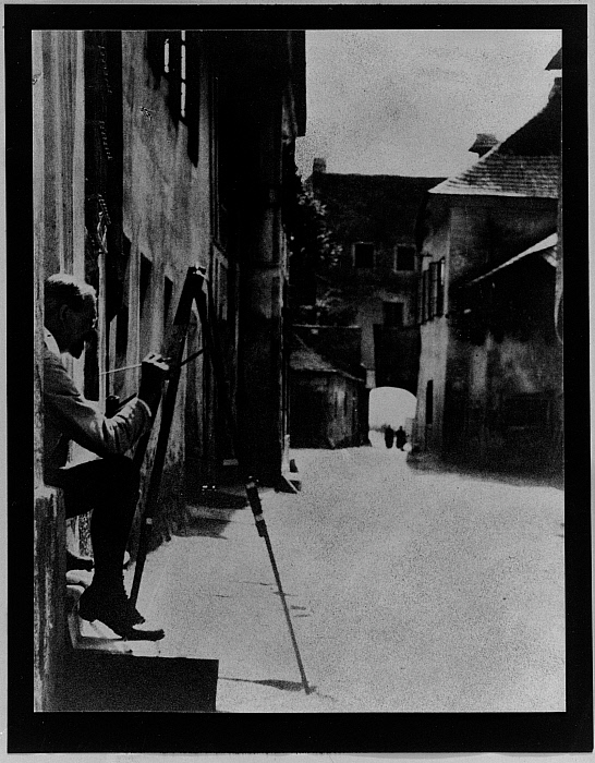 Artist Painting in Doorway