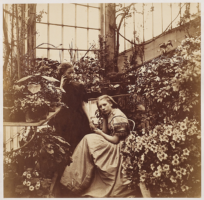 Two young women in a conservatory
