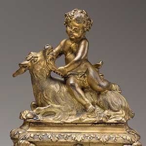 Pair of Andirons: Child and Goat