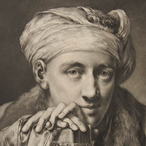 Man Wearing a Turban and Leaning on a Book