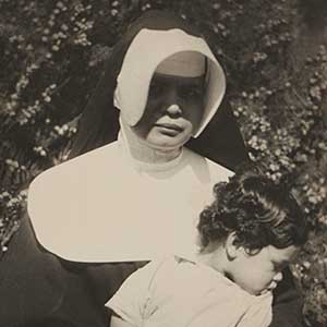 Nun with Orphan