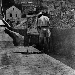 Artist Painting on Stone Street