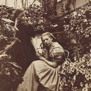 Two young women in a conservatory