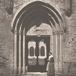 Arlesienne at the Entrance of the Cloisters of St. Trophime